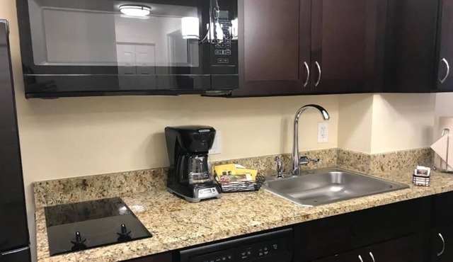 Varsity Clubs of America-Tucson Chapter offers Pool & Kitchenette"
