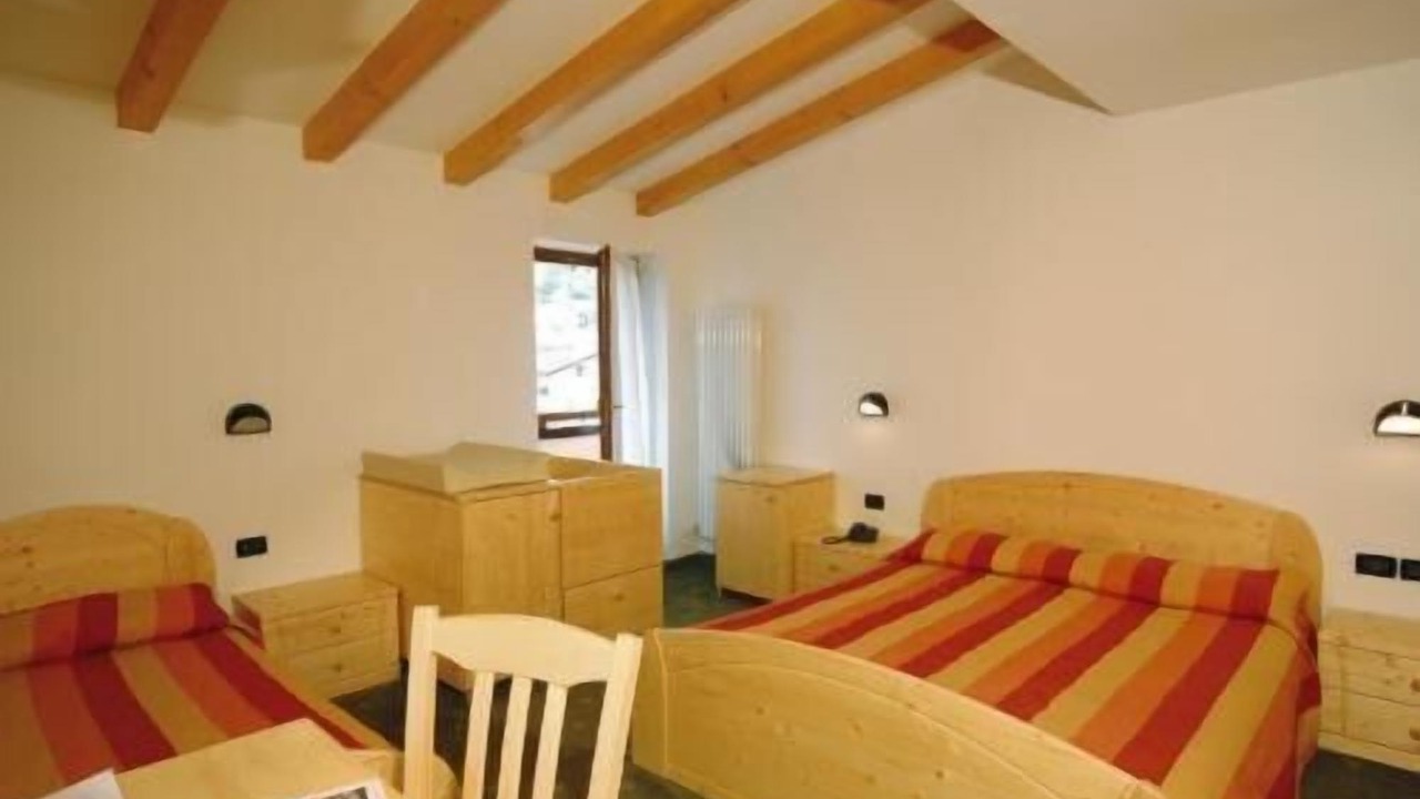 Photo of Bedroom in Baselga di Pine