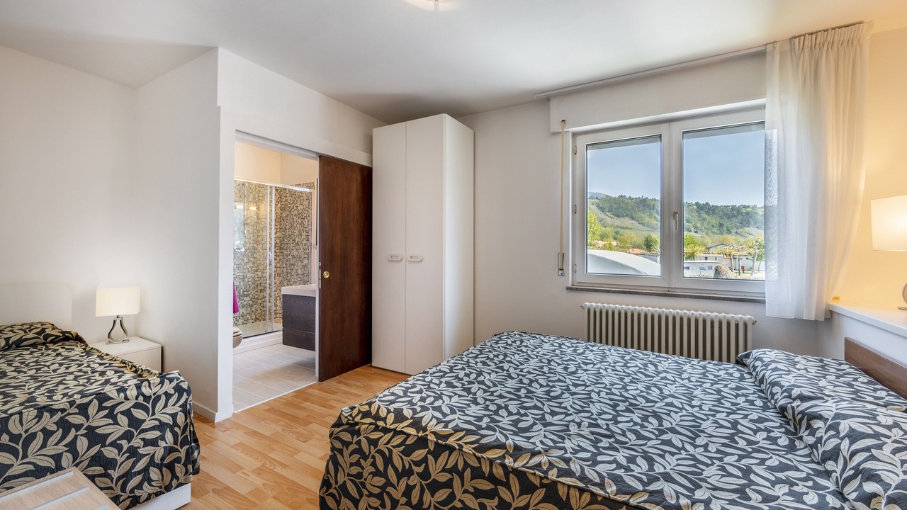 Photo of Bedroom in Calceranica al Lago