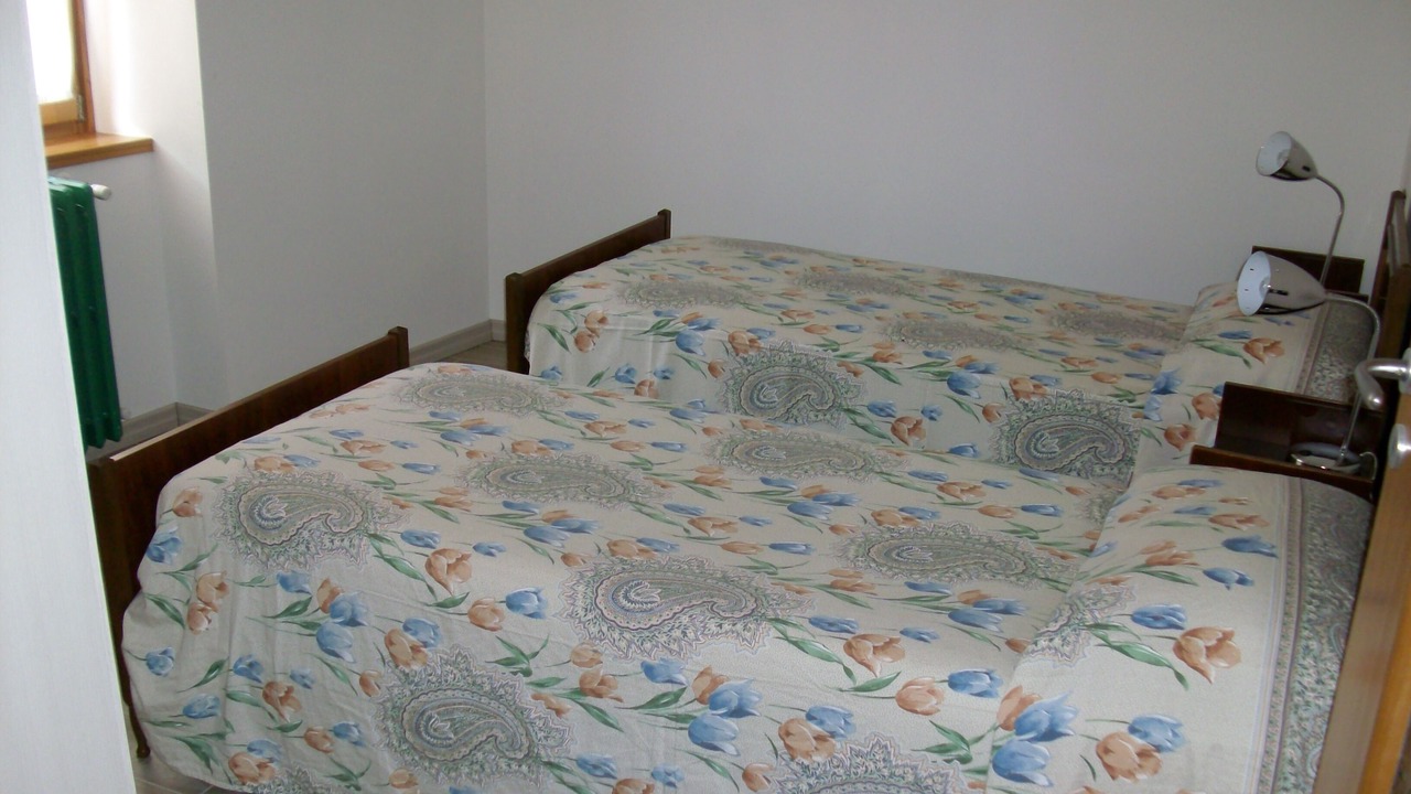 Photo of Bedroom in Tione di Trento