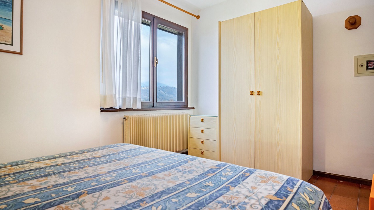 Photo of Bedroom in Calceranica al Lago