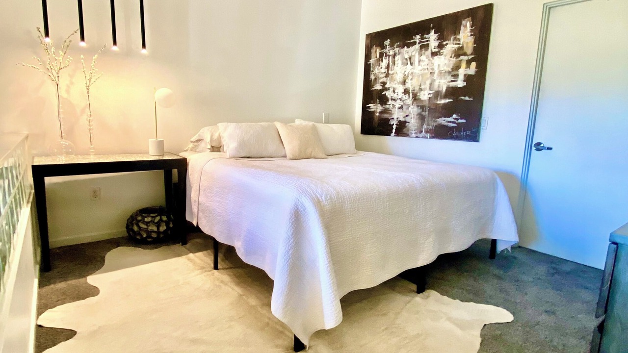 Photo of Bedroom in Brown and Stetson Business
