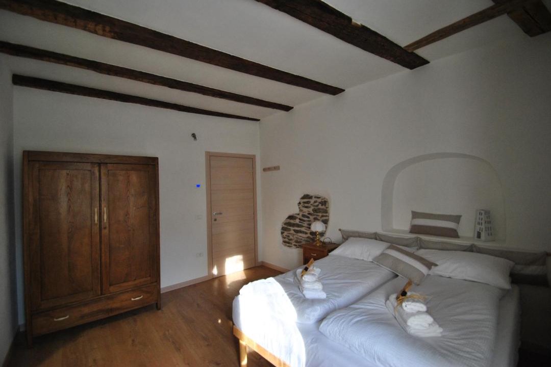 Photo of Bedroom in Calceranica al Lago