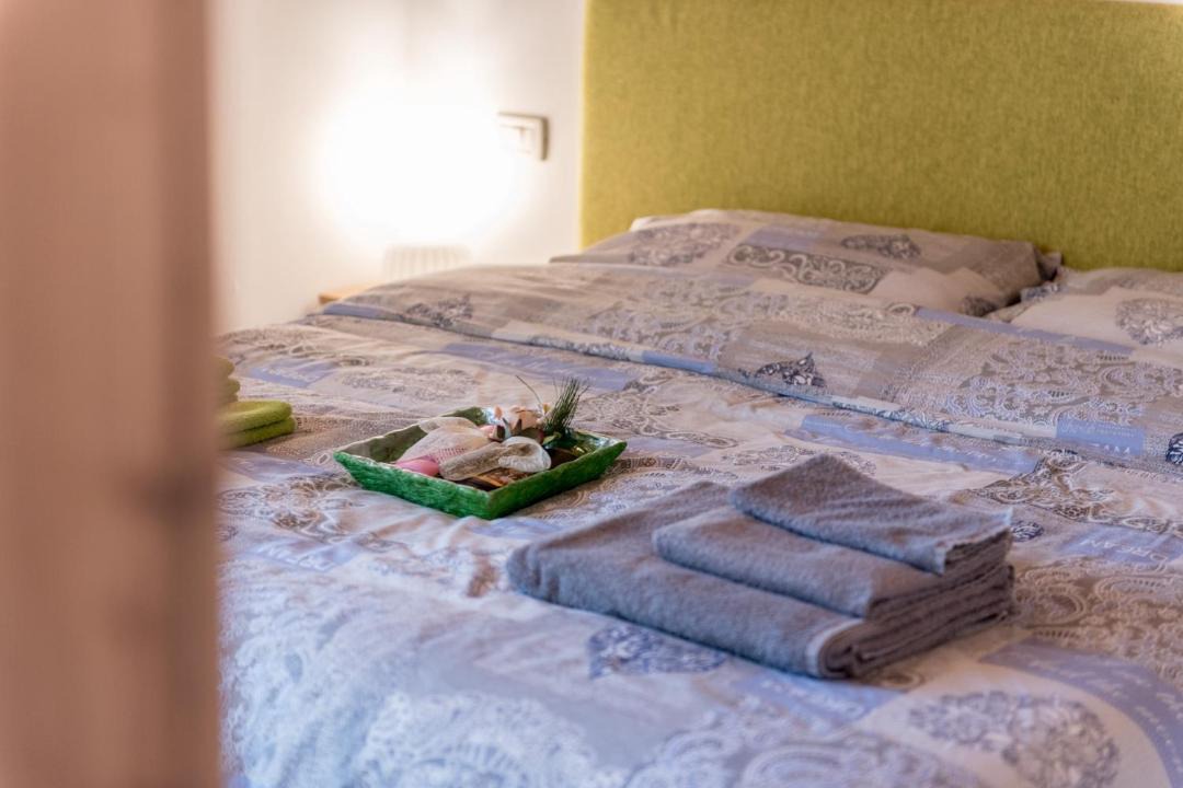 Photo of Bedroom in Calceranica al Lago