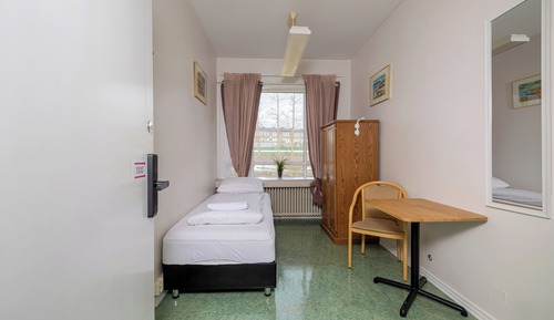 Single Room Shared Bathroom