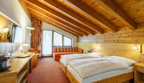 Deluxe Double Room with Matterhorn View and Balcony or Ground Floor Terrace