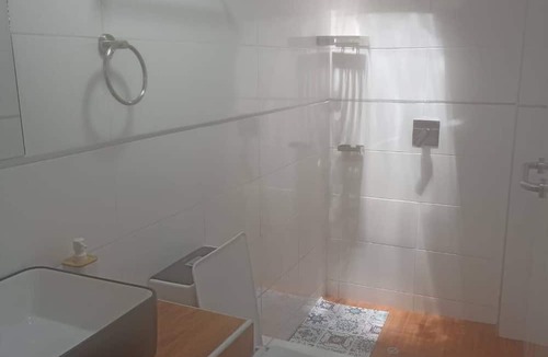 Puno House | Cozy room with TV and private bathroom