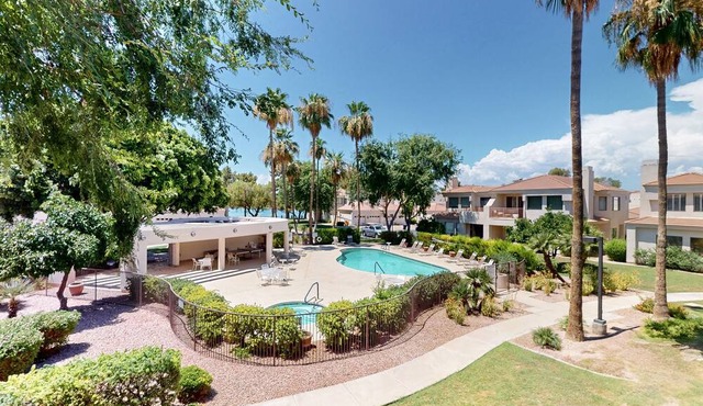 Charming house offers a resort-style pool and a friendly neighborhood